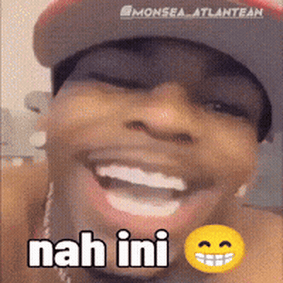 A Close Up Of A Man 'S Face With The Words Nah Ini Written On It GIF