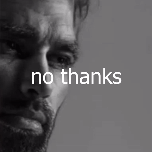 A Close Up Of A Man 'S Face With The Words " No Thanks " Above Him GIF