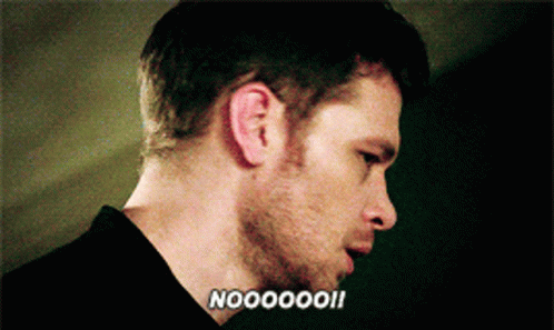 A Close Up Of A Man 'S Face With The Words " Noooooo " Written On The Bottom GIF