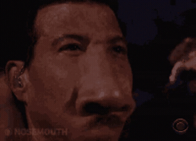 A Close Up Of A Man 'S Face With The Words Nosemouth Written On The Bottom GIF
