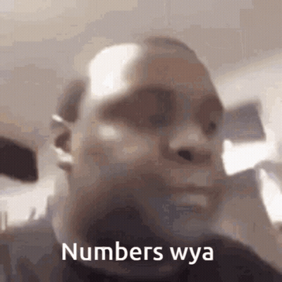 A Close Up Of A Man 'S Face With The Words Numbers Wya On It GIF