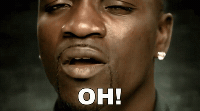 A Close Up Of A Man 'S Face With The Words Oh Written Above His Mouth GIF