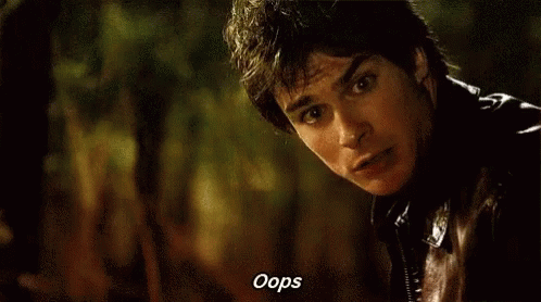 A Close Up Of A Man 'S Face With The Words Oops On The Bottom GIF