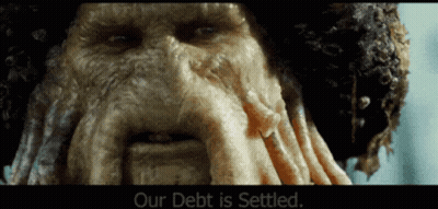 A Close Up Of A Man 'S Face With The Words Our Debt Is Settled Below It GIF