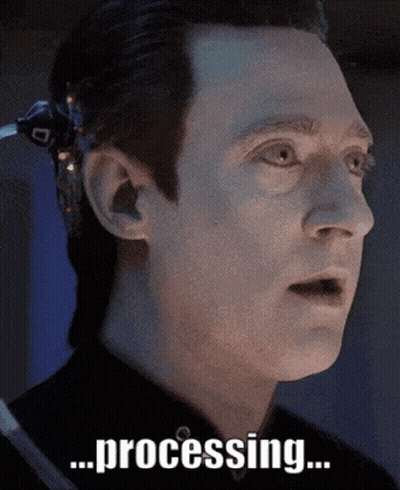 A Close Up Of A Man 'S Face With The Words Processing Written On It GIF