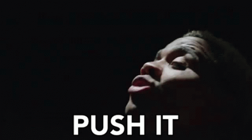 A Close Up Of A Man 'S Face With The Words `` Push It '' Written On The Bottom . GIF