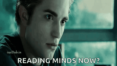 A Close Up Of A Man 'S Face With The Words Reading Minds Now Written On It . GIF