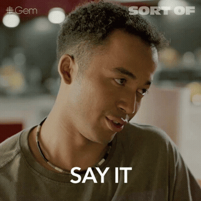 A Close Up Of A Man 'S Face With The Words Say It Written On It GIF