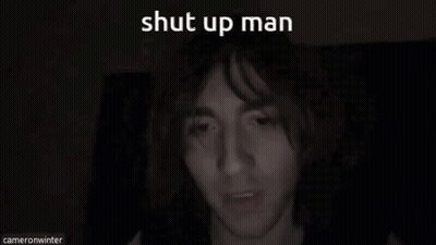 A Close Up Of A Man 'S Face With The Words Shut Up Man Written Above Him GIF