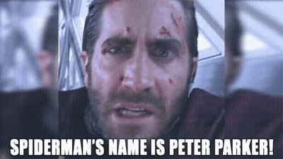 A Close Up Of A Man 'S Face With The Words `` Spiderman 'S Name Is Peter Parker '' Written On It . GIF