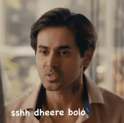 A Close Up Of A Man 'S Face With The Words Sshh Gheere Bolo Written On The Bottom GIF