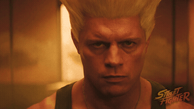 A Close Up Of A Man 'S Face With The Words Street Fighter On The Bottom Right GIF
