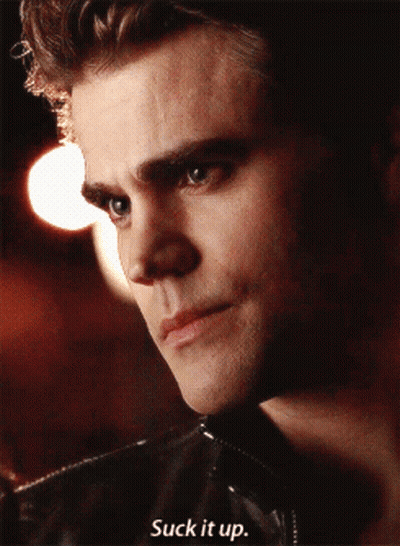 A Close Up Of A Man 'S Face With The Words Suck It Up Below It GIF