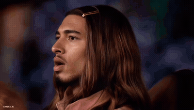 A Close Up Of A Man 'S Face With The Words Syntx.ai At The Bottom GIF