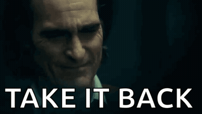 A Close Up Of A Man 'S Face With The Words `` Take It Back '' Written On It . GIF