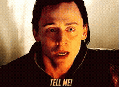 A Close Up Of A Man 'S Face With The Words Tell Me Written On It GIF