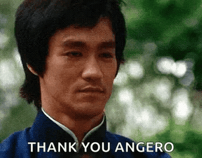 a close up of a man 's face with the words thank you angero below him