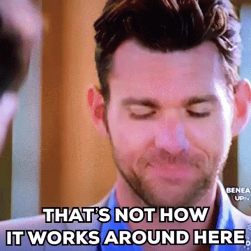 A Close Up Of A Man 'S Face With The Words `` That 'S Not How It Works Around Here '' . GIF