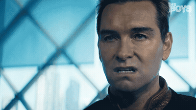A Close Up Of A Man 'S Face With The Words " The Boys " On The Bottom GIF