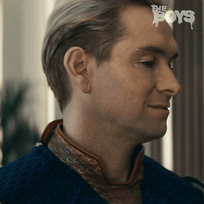 A Close Up Of A Man 'S Face With The Words " The Boys " Written On His Forehead GIF