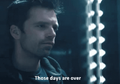 A Close Up Of A Man 'S Face With The Words Those Days Are Over Below Him GIF