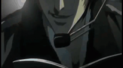 Close Up Of Man's Face With Translator's Note Keikaku Means Plan GIF