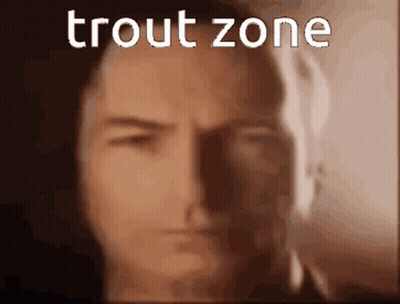 A Close Up Of A Man 'S Face With The Words Trout Zone Written Above Him GIF