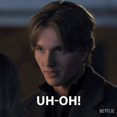 A Close Up Of A Man 'S Face With The Words Uh-Oh On The Bottom GIF