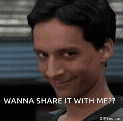 A Close Up Of A Man 'S Face With The Words `` Wanna Share It With Me '' Written On It . GIF