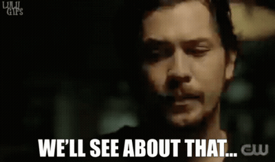 A Close Up Of A Man 'S Face With The Words `` We 'Ll See About That '' Written Below Him . GIF