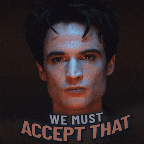 A Close Up Of A Man 'S Face With The Words We Must Accept That Above Him GIF