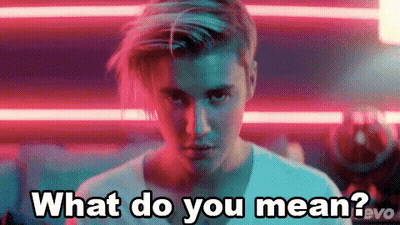 A Close Up Of A Man 'S Face With The Words What Do You Mean . GIF