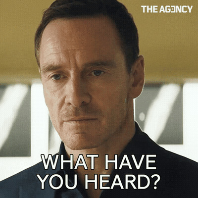 A Close Up Of A Man 'S Face With The Words " What Have You Heard " Above Him GIF