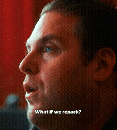 A Close Up Of A Man 'S Face With The Words " What If We Repack " Below Him GIF