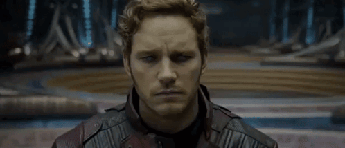 A Close Up Of A Man 'S Face With The Words `` What '' Written On The Bottom . GIF
