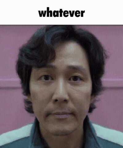 A Close Up Of A Man 'S Face With The Words " Whatever " Above Him GIF