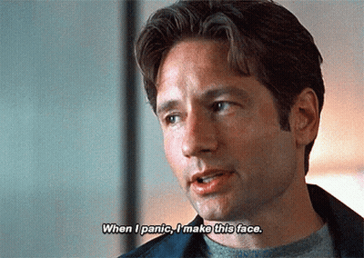 A Close Up Of A Man 'S Face With The Words When I Panic I Make This Face GIF
