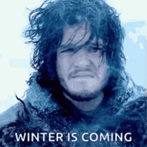 A Close Up Of A Man 'S Face With The Words `` Winter Is Coming '' . GIF