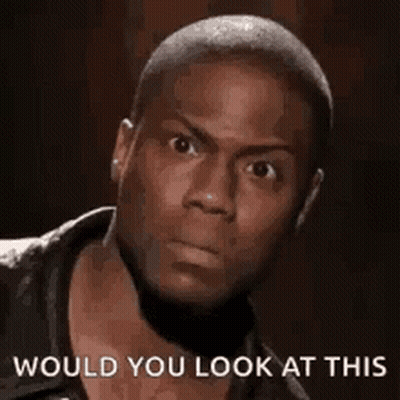 A Close Up Of A Man 'S Face With The Words `` Would You Look At This '' . GIF