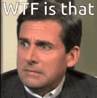 A Close Up Of A Man 'S Face With The Words Wtf Is That Written Above Him GIF