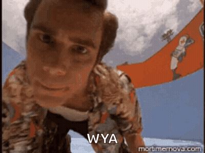 A Close Up Of A Man 'S Face With The Words Wya On The Bottom . GIF