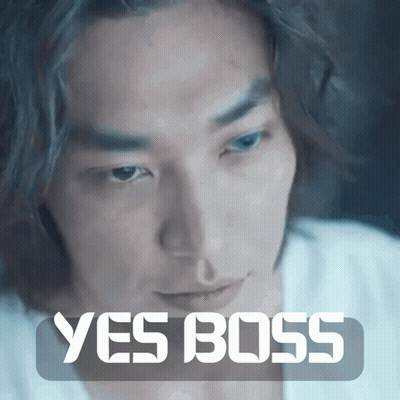 A Close Up Of A Man 'S Face With The Words " Yes Boss " Above Him GIF
