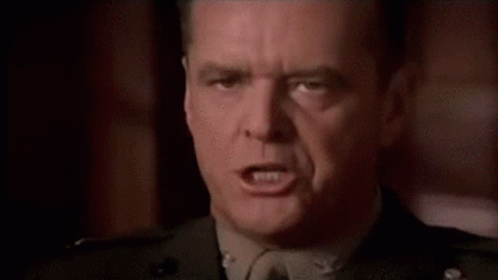 A Close Up Of A Man 'S Face With The Words You Can 'T Behind Him GIF