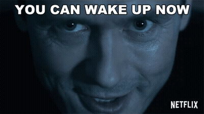 A Close Up Of A Man 'S Face With The Words You Can Wake Up Now Above Him GIF