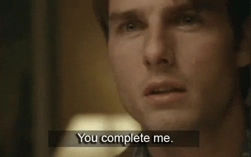 A Close Up Of A Man 'S Face With The Words `` You Complete Me '' . GIF