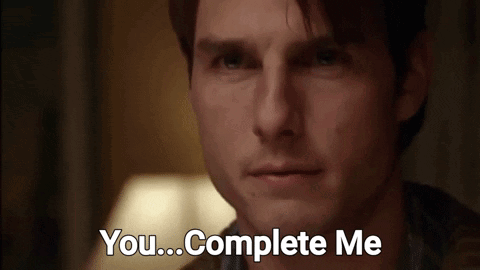 A Close Up Of A Man 'S Face With The Words You Complete Me Written Below It GIF