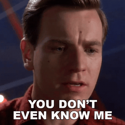 A Close Up Of A Man 'S Face With The Words You Don 'T Even Know Me GIF