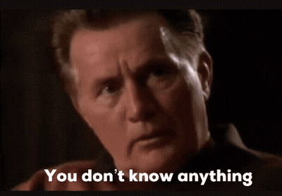 A Close Up Of A Man 'S Face With The Words You Don 'T Know Anything Below It GIF