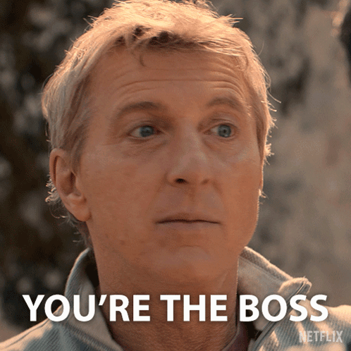 A Close Up Of A Man 'S Face With The Words " You 'Re The Boss " GIF