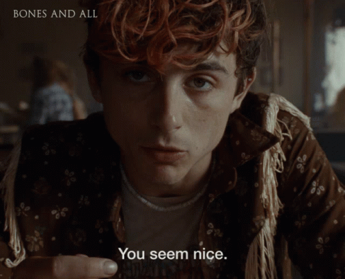 A Close Up Of A Man 'S Face With The Words " You Seem Nice " On The Bottom GIF